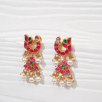 Pair of gold-plated silver earrings with pink, green enamel and pearl drops on white background