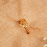 Gold-plated silver ring with heart and love design, studded with cubic zirconia stones