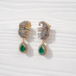 Gold-plated elephant stud earrings with green teardrop stones and sparkling accents