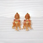 Traditional gold-plated silver jhumka earrings with pearl and red stone detailing