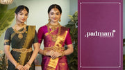 Two women in traditional Indian sarees wearing 92.5 silver jewelry, necklaces, and earrings.