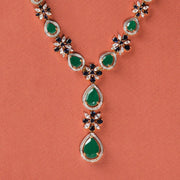 Silver Stone Studded Necklace with Floral and Drop Design