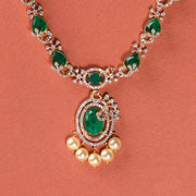 Floral Silver Necklace with Green Stones and Floral Accents