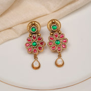 Silver Floral Earrings with Red and Green Kundans