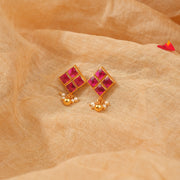 Silver Diamond-Shaped Earrings with Pink Kundans