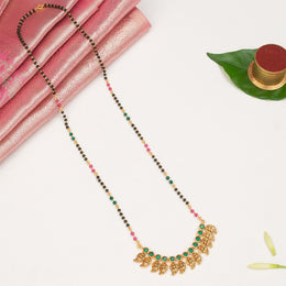 Long Black Beads with Green & Pink Accents and Leaf Motif Pendant