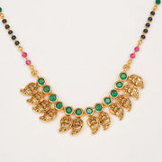 Long Black Beads with Green & Pink Accents and Leaf Motif Pendant