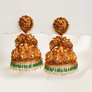 Heavy Temple Finish Silver Jhumkas with Floral and Peacock Detailing