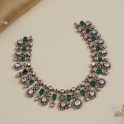 Silver Kundan and Emerald Necklace with Drop-Shaped Design