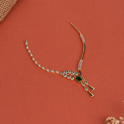 Partywear Silver Necklace with CZs, Emeralds, and Leaf Design