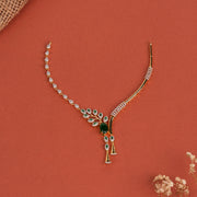 Partywear Silver Necklace with CZs, Emeralds, and Leaf Design