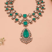 Silver Stepped Haaram with Floral Detailing and Emeralds