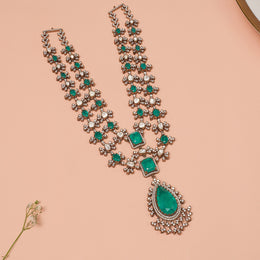 Silver Stepped Haaram with Floral Detailing and Emeralds
