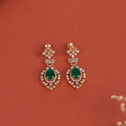 Fine Silver Earrings with Floral Stud and Emerald Hanging