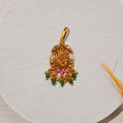 Traditional Silver Pendant with Emerald Beads