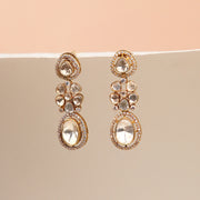 Elelgant Silver Kundan Earrings with Floral Drop Hangings