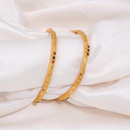 Elegant Gold Bangles with Ruby and Emerald Stone Accents