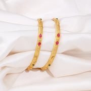 Elegant Gold Bangles with Ruby and Emerald Stone Accents
