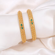 Traditional Gold Bangles with Green Stone Accents