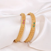 Traditional Gold Bangles with Green Stone Accents