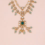 Elegant Polki Necklace with Emerald Centerpiece and Jade Bead Drops