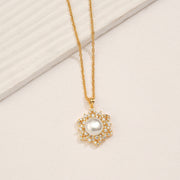 Silver and Stone Floral Pendant with Pearl Highlight