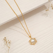 Silver and Stone Floral Pendant with Pearl Highlight