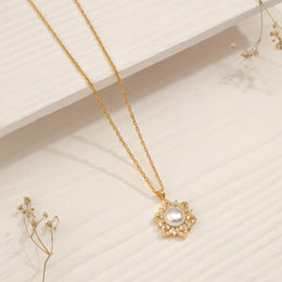 Silver and Stone Floral Pendant with Pearl Highlight