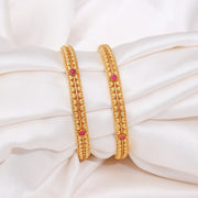 Traditional Textured Gold Bangles with Ruby Stone Accents