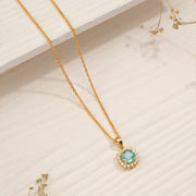 Silver Chain Pendant with Blue Stone Highlight