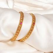 Sleek Silver Bangles with Heritage-Inspired Shell Design