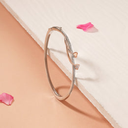 Sleek Silver Kada with Rose Gold Heart Embellishments and CZs