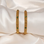 Antique Silver Bangles with Floral Motif and Green Stone Highlights