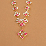 Regal Silver Necklace with Floral Design and Red Stone Highlights