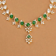 Elegant Silver and CZ Necklace with Petal Design and Green Stones