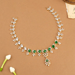 Elegant Silver and CZ Necklace with Petal Design and Green Stones