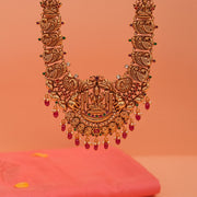 Sleek Silver Haaram with Lakshmi and Peacock Detailing