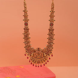 Sleek Silver Haaram with Lakshmi and Peacock Detailing