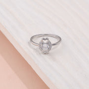 Elegant Sterling Silver Solitaire Ring with Halo Zircon and Heart Accents