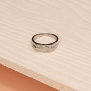 Elegant Silver Ring with Geometric Engravings