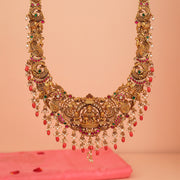 Traditional Silver Long Haaram with Lakshmi Devi, Peacock, and Elephant Detailing