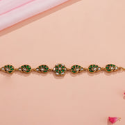 Elegant Silver Bracelet with Green Kundans and Leaf Design