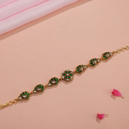 Elegant Silver Bracelet with Green Kundans and Leaf Design