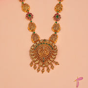 Silver Laskhmi Devi Necklace with Floral Stone Work and Bead Hangings