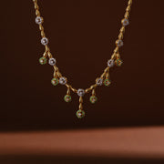 Simple Silver CZ Necklace with Grain & Flower Design