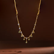 Simple Silver CZ Necklace with Grain & Flower Design