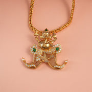 Bold Tiger Nail Pendant with Lord Ganesh Detailing