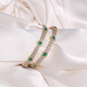 Leaf & Drop Shaped Silver CZ Bangles with Green Stone Highlights