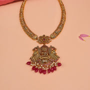 Floral Silver Kante Necklace with Lakshmi Devi and Peacock Pendant