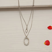 Sleek Two Layered Silver Chain with Oval and Leaf Pendants